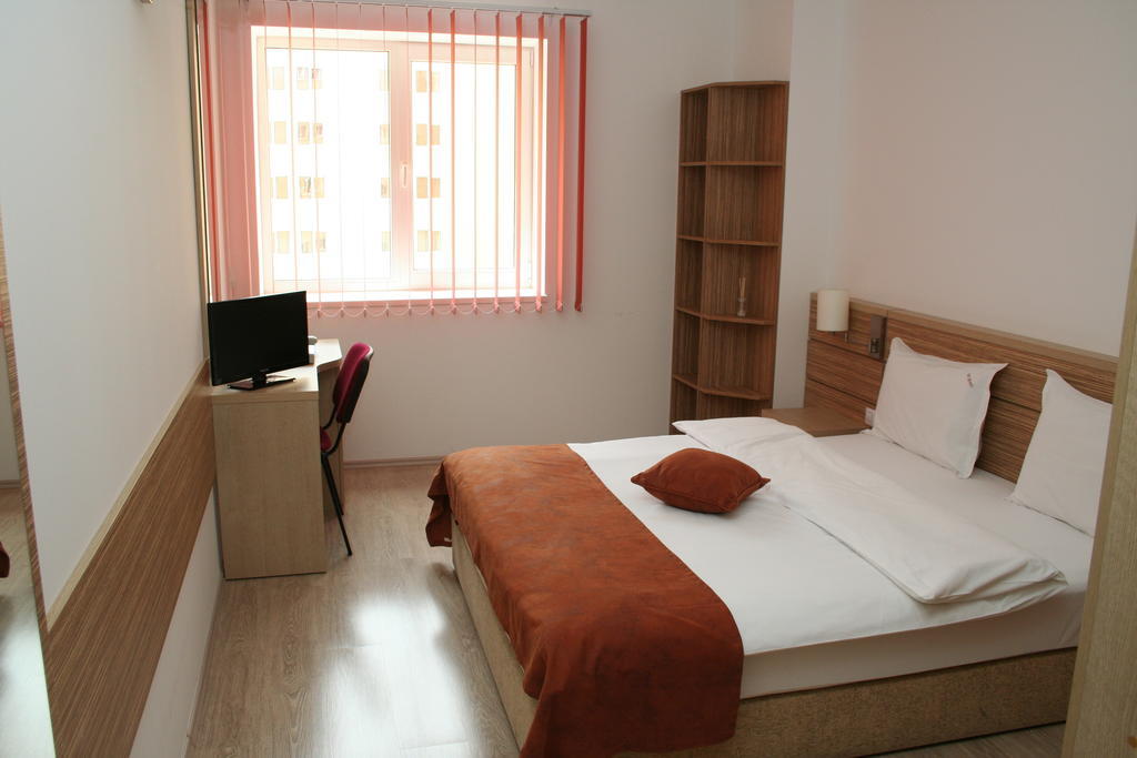 Top Rooms Aparthotel Bucarest Habitación foto