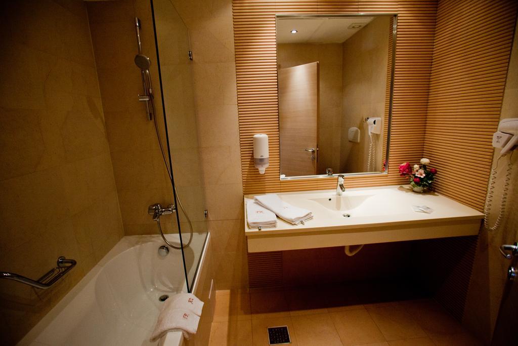 Top Rooms Aparthotel Bucarest Habitación foto